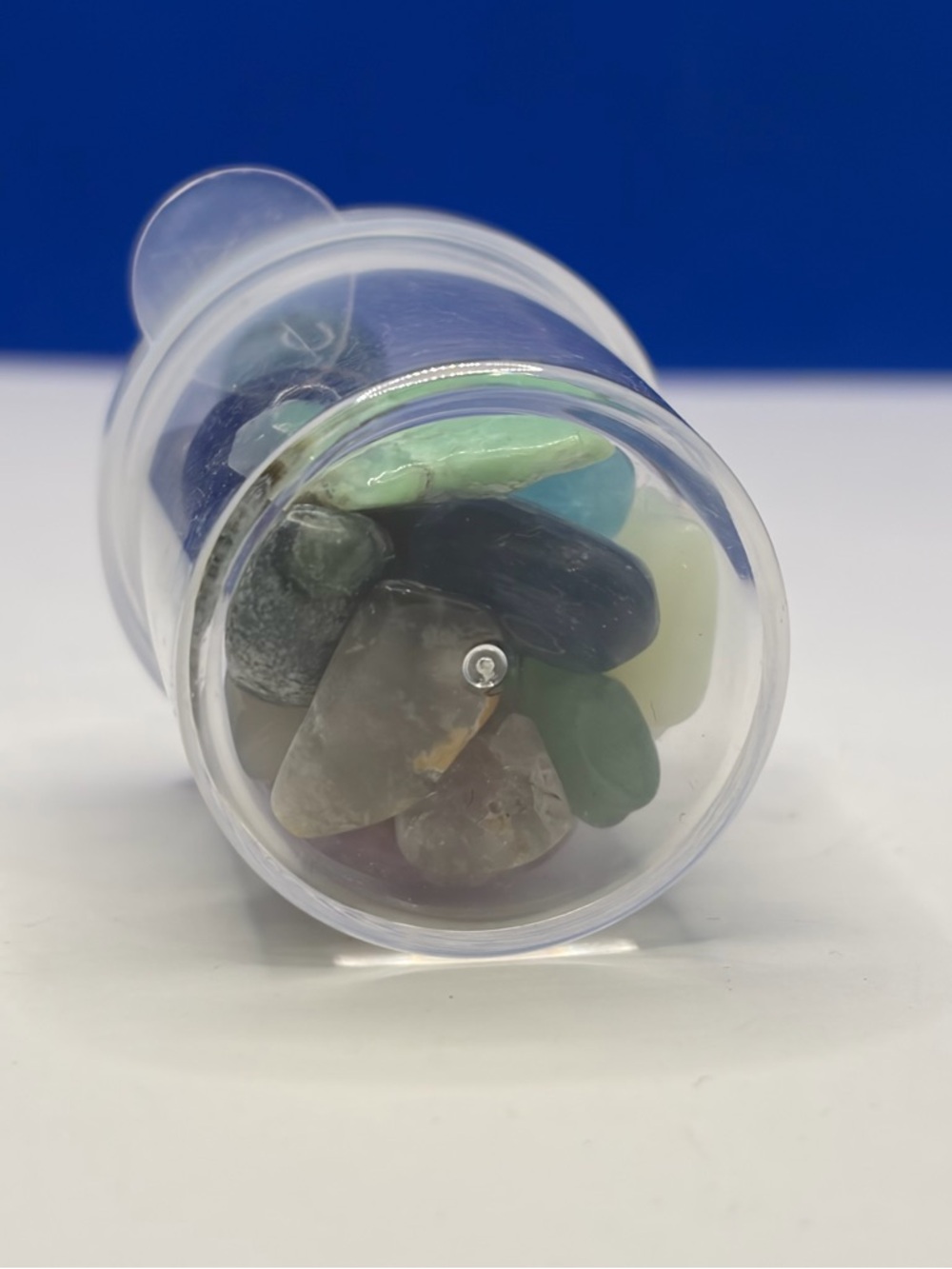 Assorted Polished Crystal Tumbles in 1” Clear Storage Jar - Picture 5 of 5